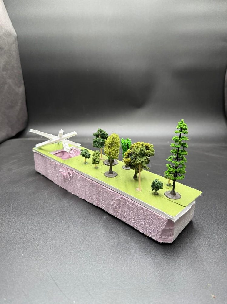Model — the strip in shadow