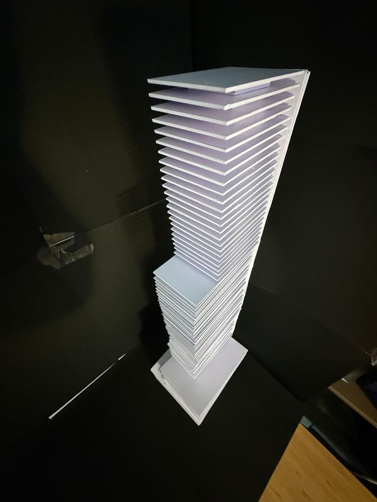 Massing model — the tower as stacked, shifting plates