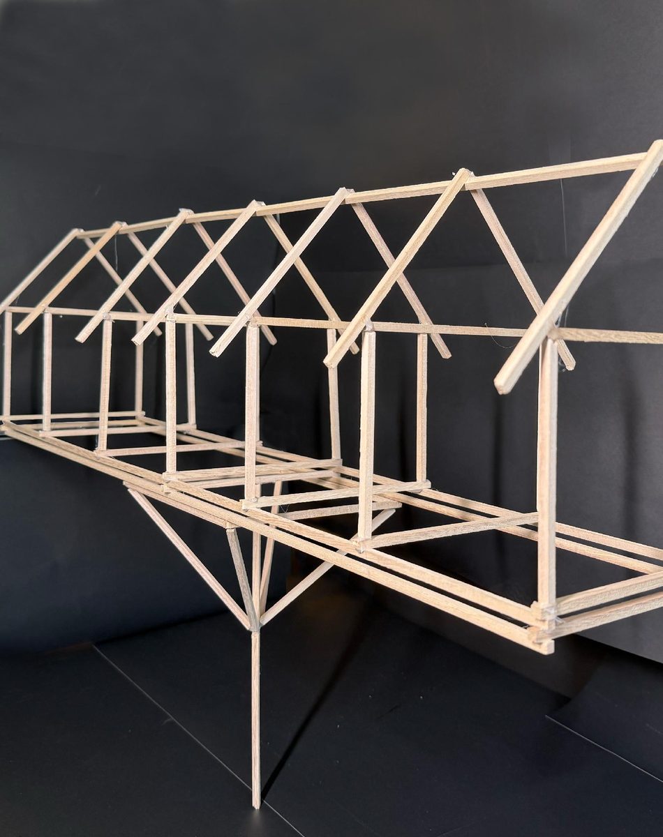 The same frame on its axis — bays, posts, one span